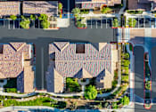 Thumbnail 94 of 123 - an aerial view of a neighborhood with houses and trees