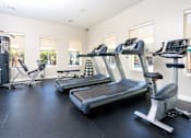 Thumbnail 7 of 123 - two treadmills and elliptical machines in the fitness room