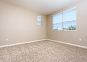 Thumbnail 21 of 123 - an empty bedroom with a large window