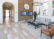 Thumbnail 38 of 62 - leasing lobby with stylish lounge chairs at Capriana at Chino Hills, Chino Hills