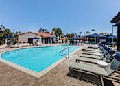 Thumbnail 25 of 57 - Outdoor pool area with lounge chairs at Pointe Niguel, Laguna Niguel, California