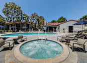 Thumbnail 33 of 57 - Outdoor pool and jacuzzi area with seating at Pointe Niguel, Laguna Niguel, California