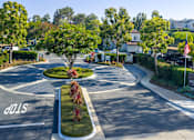 Thumbnail 53 of 57 - A street view of a residential area with a sign that reads "Pointe Niguel".