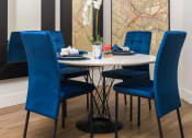 Thumbnail 14 of 59 - Artistic Finished Dining Room at The Preston Miracle Mile Apartments, California