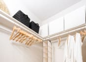 Thumbnail 21 of 59 - Walk in closet with wooden floors at The Preston Miracle Mile Apartments, Los Angeles, CA, California, 90036
