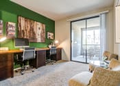 Thumbnail 55 of 84 - Office area with sliding glass doors to balcony at The Promenade Rio Vista, San Diego, CA, 92108