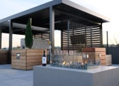 Thumbnail 37 of 83 - Lounge seating with fire pit at Bayswater Apartments, Burlingame, 94010
