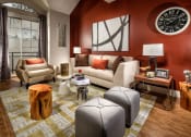Thumbnail 5 of 59 - Living area with large window at The Preston Miracle Mile Apartments, Los Angeles, 90036