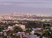 Thumbnail 63 of 117 - A cityscape at dusk with buildings and lights visible. at Skyview Sunset, Los Angeles, CA, 90046