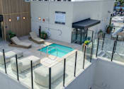 Thumbnail 11 of 117 - Rooftop Pool With Chairs at Skyview Sunset, Los Angeles, CA