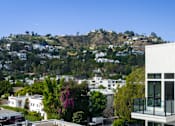 Thumbnail 104 of 117 - A white building with a balcony at Skyview Sunset, California, 90046
