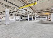 Thumbnail 14 of 40 - the parking garage at the top of the building is empty