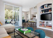 Thumbnail 3 of 36 - Living Area with Beige Interiors,  at Montrachet Apartments, Napa, CA, 94558Wood-Style Flooring, and Sliding Glass Patio Doors at Montrachet Apartments, Napa