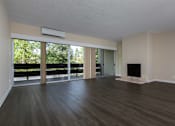 Thumbnail 15 of 29 - Empty Living Room With High Ceiling With Access To Wide Balcony at Palo Alto Place, California, 94306