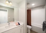 Thumbnail 57 of 87 - Bathroom with sink toilet and tub