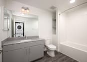 Thumbnail 76 of 87 - Bathroom with sink, toilet and tub