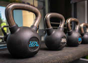 Thumbnail 31 of 85 - A set of kettlebells with the numbers 25, 20, and 15 written on them.
