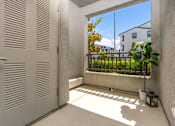 Thumbnail 72 of 85 - A white door with a window in front of it.