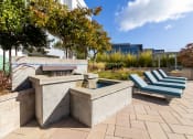 Thumbnail 27 of 50 - patio lounge chairs and fountain at Strata at Mission Bay, California