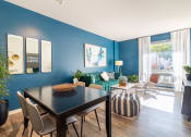 Thumbnail 2 of 50 - a living room with blue walls and a table and chairs at Strata at Mission Bay, San Francisco, 94158