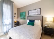 Thumbnail 8 of 50 - a bedroom with a large bed and a window at Strata at Mission Bay, San Francisco, 94158