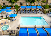 Thumbnail 25 of 39 - Aerial view of the swimming pool and lounge seating at Sunstone Place, Riverside, CA, 92505