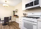 Thumbnail 13 of 39 - kitchen and dining area at Sunstone Place, California, 92505