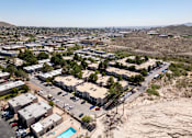 Thumbnail 59 of 142 - A bird's eye view of a residential complex with a swimming pool.