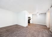 Thumbnail 126 of 142 - A room with a brown carpet and a white ceiling.