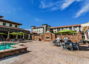Thumbnail 8 of 39 - resident pool with bbq patio area at Terracina, Broomfield, CO