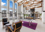 Thumbnail 14 of 39 - a living room with a pool table and large windows at Terracina, Broomfield, CO 80020