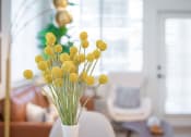 Thumbnail 28 of 39 - a vase of yellow flowers in a living room at Terracina, Colorado
