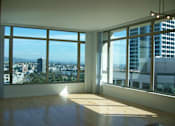 Thumbnail 47 of 104 - A room with a view of the cityscape. with large windows at The Grand Apartments, Oakland, CA, 94612
