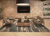 Thumbnail 27 of 84 - Clubroom seating area and TV at The Promenade Rio Vista, San Diego, California