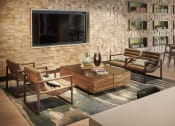 Thumbnail 28 of 84 - Clubroom seating area and TV at The Promenade Rio Vista, San Diego, CA