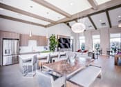 Thumbnail 12 of 85 - Clubroom kitchen with dining area