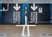 Thumbnail 12 of 59 - Electric Vehicle Charging in parking area at The Preston Miracle Mile Apartments, Los Angeles
