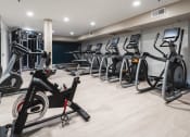 Thumbnail 3 of 59 - Fitness Center With Modern Equipment at The Preston Miracle Mile Apartments, Los Angeles, CA