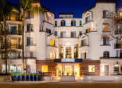 Thumbnail 1 of 59 - Exterior of entrance to building at The Preston Miracle Mile Apartments, California, 90036