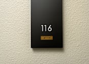 Thumbnail 45 of 137 - A black box with the number 116 on it.