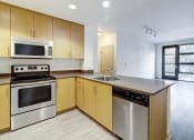 Thumbnail 22 of 51 - unfurnished kitchen with stainless steel appliances at Venue, San Francisco, CA, 94158