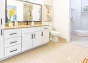 Thumbnail 23 of 34 - a bathroom with a sink and a toilet at Waterford RiNo, Denver