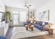 Thumbnail 20 of 34 - Living Room with Wood-Style Plank Flooring at Waterford RiNo, Colorado