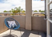 Thumbnail 1 of 16 - Balcony with seating at Driftwood, San Diego, CA