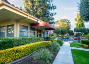 Thumbnail 7 of 40 - Leasing office entrance at Woodbend, Alta Loma, California