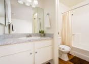 Thumbnail 20 of 40 - Bathroom with sink, toilet and shower at Woodbend, California, 91701