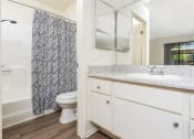 Thumbnail 29 of 40 - Sink, bathroom and shower at Woodbend, Alta Loma, CA, 91701