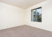 Thumbnail 31 of 40 - Bedroom with Carpet and Spacious Window at Woodbend, Alta Loma, California