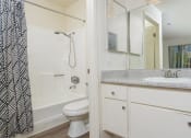 Thumbnail 33 of 40 - Bathroom with sink, toilet and shower at Woodbend, California, 91701