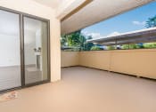 Thumbnail 39 of 40 - Large balcony with sliding door to unit at Woodbend, California, 91701